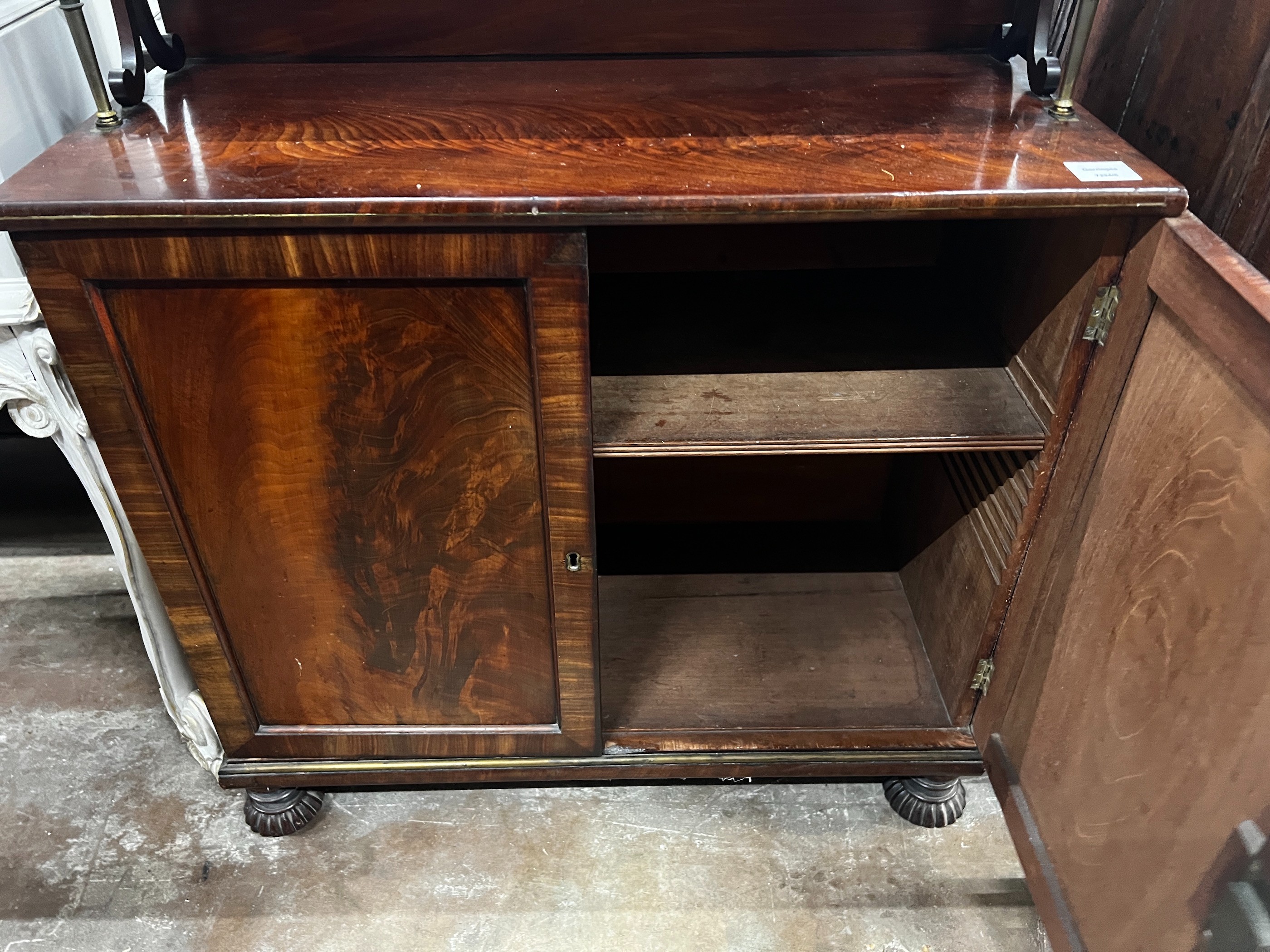 A small Regency mahogany and brass strung chiffonier, width 78cm, depth 37cm, height 122cm